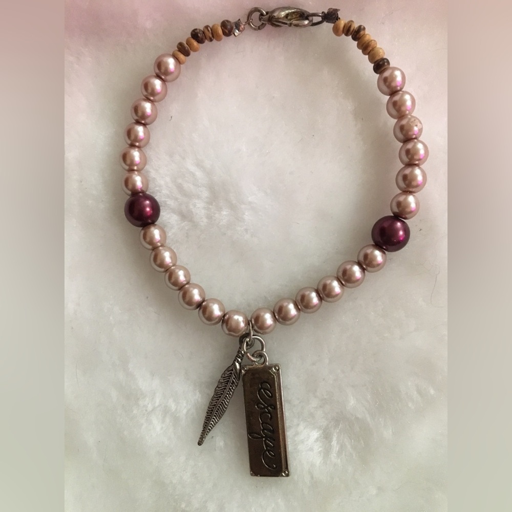 Elegant Beaded Bracelet with Charm